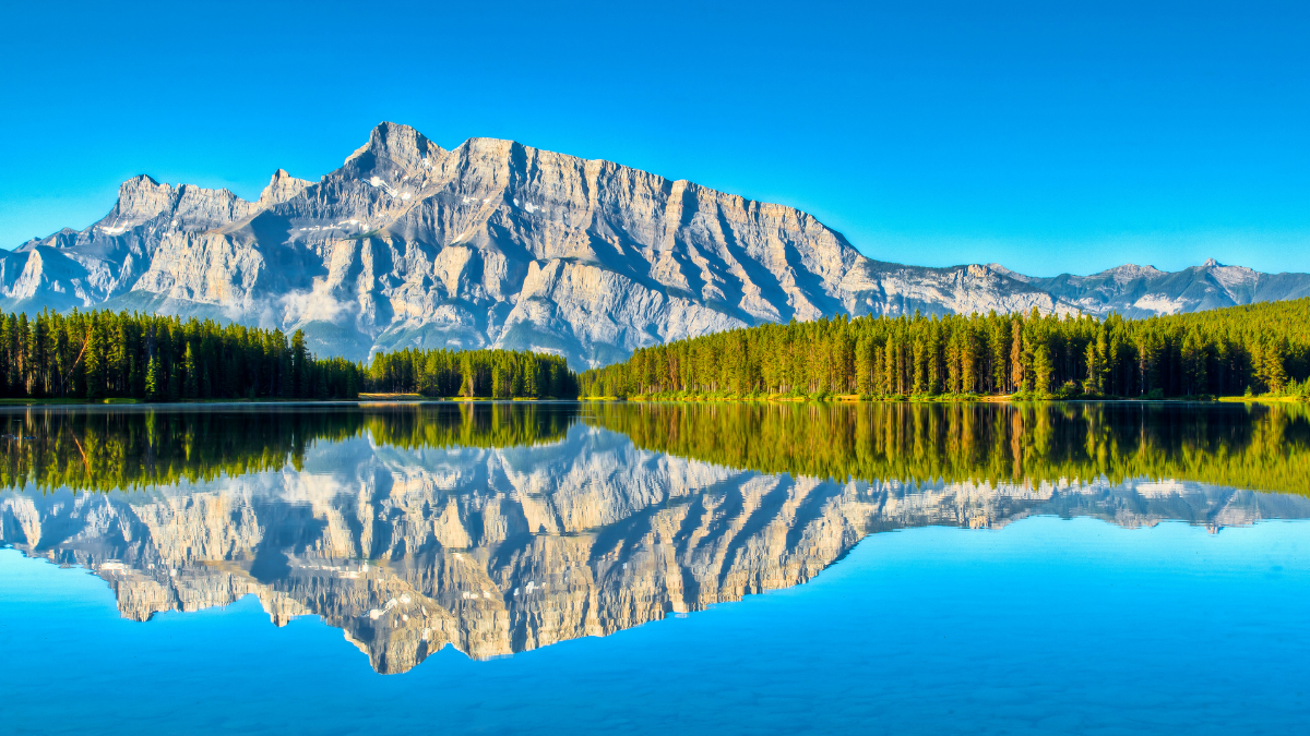 Mountains reflected on water